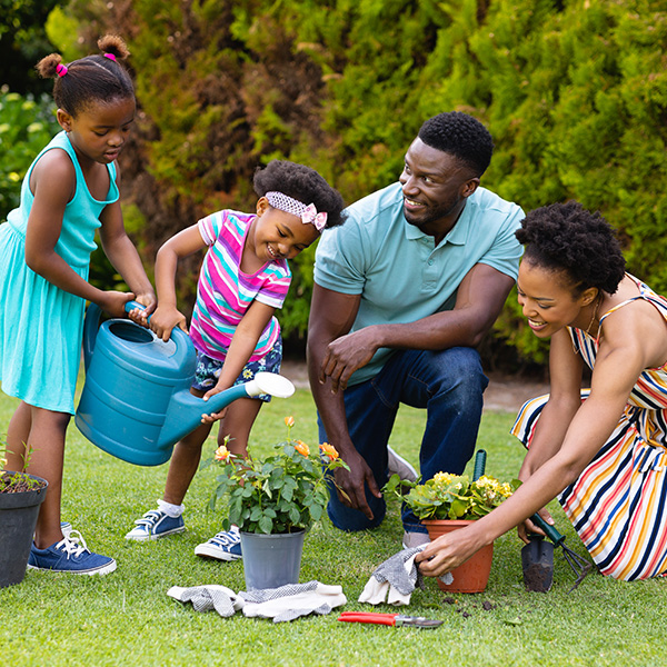 A-family-working-together-in-the-garden