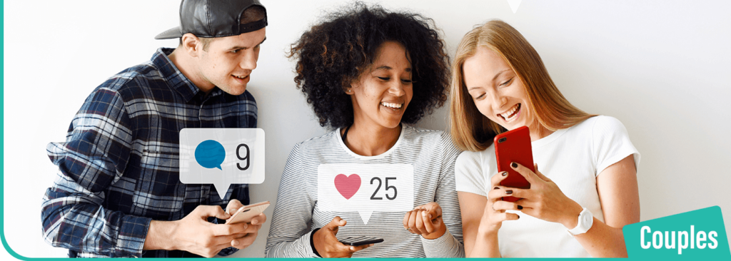 Friends-looking-at-each-others-mobile-phones