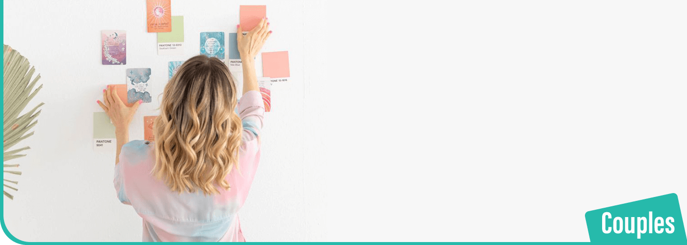 A-woman-busy-organizing-cards-on-a-wall