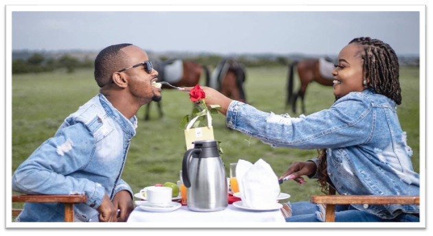 Couple having breakfast outside