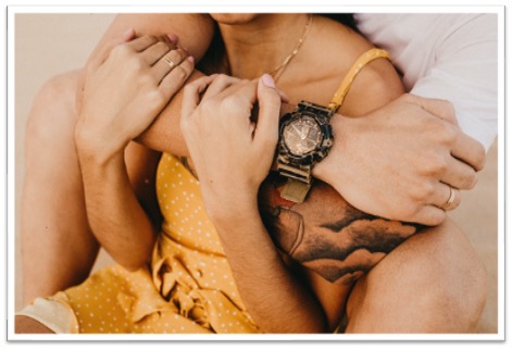 Couple hugging each other close