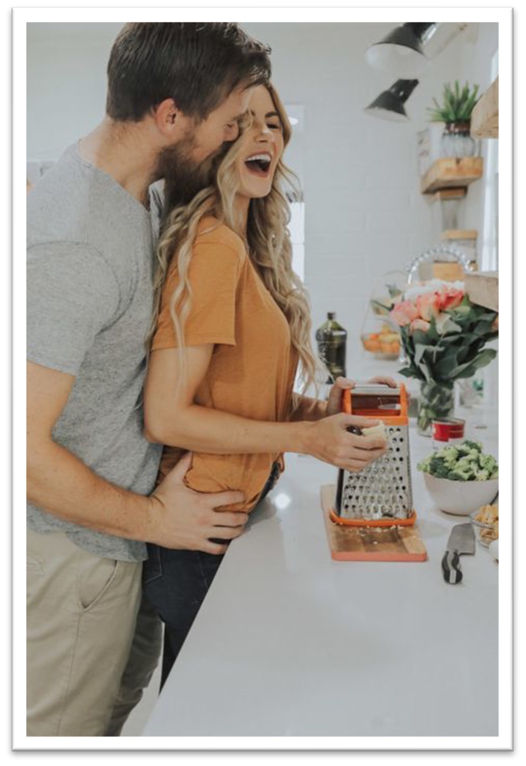 Couple in the kitchen kissing