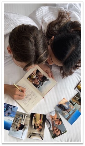 Couple writing in their journal