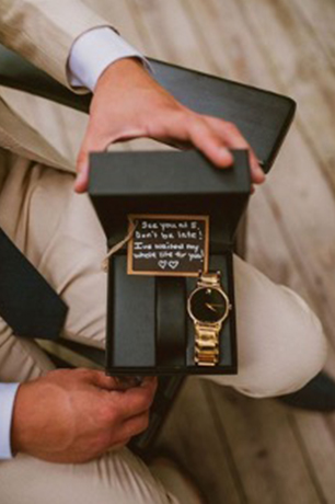 Man-getting-a-watch-as-a-gift