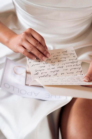 Women-getting-married-reading-a-letter